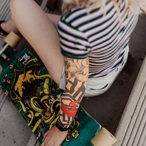 Vista 3 de Mangas de tatuaje para hombres y mujeres, mangas de protección solar temporales para brazos, para hombres, adolescentes y niños, Varios