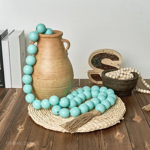 Vista 23 de OMISHE Guirnalda de cuentas de madera extra grande con cuentas de madera y borlas de 1.6 pulgadas de diámetro, cuentas decorativas rústicas de 41