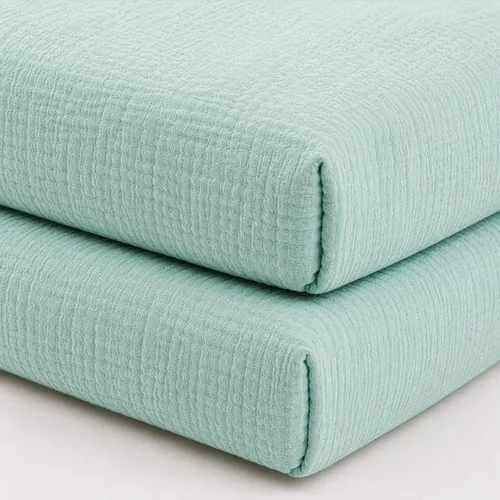 Vista 2 de Newton Baby Sábana bajera ajustable de doble capa para cuna (paquete de 2), ultra transpirable y suave, gasa orgánica, se adapta a todas las cunas