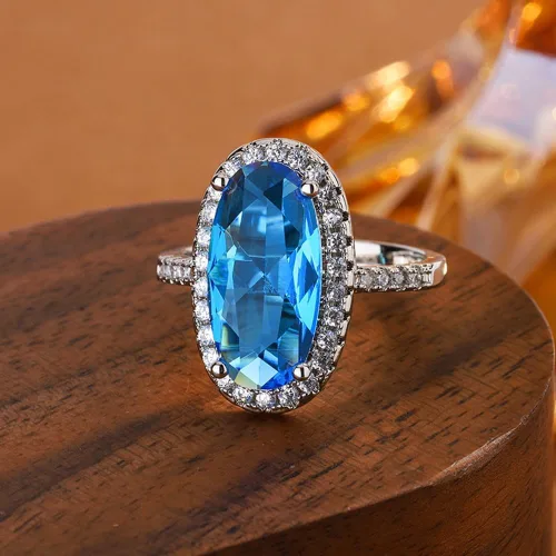 Vista 4 de YUANYI Anillo de compromiso de aniversario con topacio azul ovalado de moda vintage chapado en platino