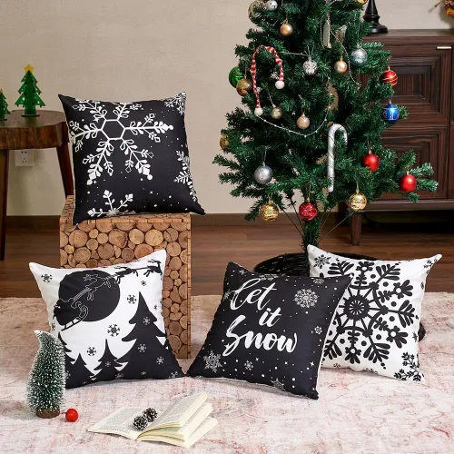 Vista 2 de JOJOGOGO Fundas de almohada de Navidad en blanco y negro 18x18, juego de 4, fundas de almohada decorativas de invierno con copos de nieve para sofá