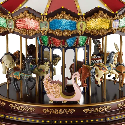 Vista 5 de Mr. Christmas - Tiovivo Deluxe Musical Navideño Animado, Luces LED, Reproduce 20 Canciones, 38 cm, Multicolor