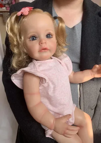 Vista 4 de Pinky Reborn Muñeca realista Reborn de 22 pulgadas, muñeca de silicona de cuerpo completo recién nacido, muñeca de bebé recién nacido, de aspecto
