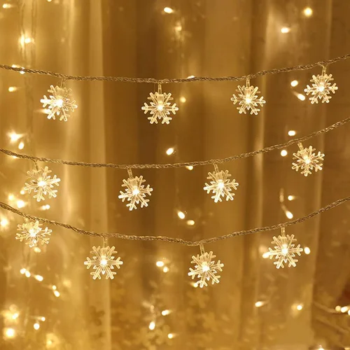 Vista 7 de WesGen - Guirnalda de luces de Navidad, tira de luces de copo de nieve, funciona con pilas, impermeable, 20 pies, 40 luces LED para Navidad, jardín
