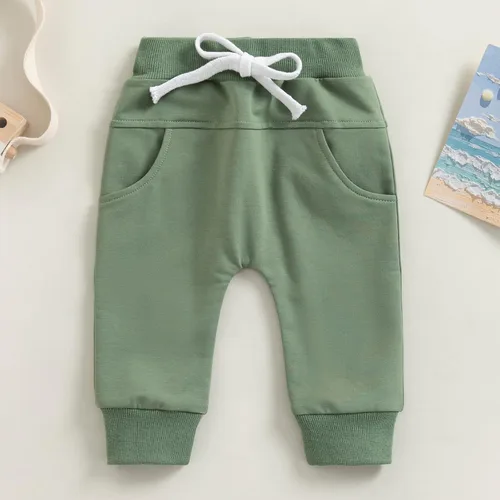 Vista 3 de Mubineo Pantalones deportivos básicos lisos para bebés, niños y niñas, cómodos pantalones de algodón con bolsillos