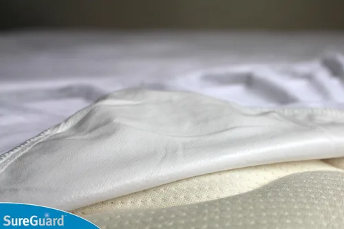 Vista 3 de Protector de colchón de SureGuard, 100% impermeable, hipoalergénico, de algodón de primera calidad, gemelo, Blanco