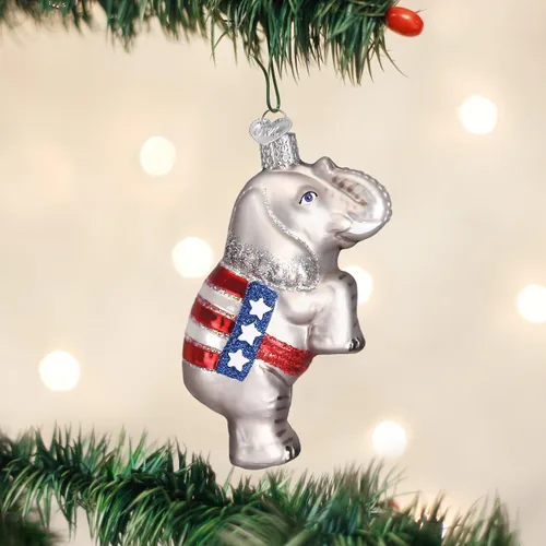 Vista 2 de Old World Christmas Adorno de cristal soplado de elefante republicano para árbol de Navidad, decoración navideña artesanal, colección de policía