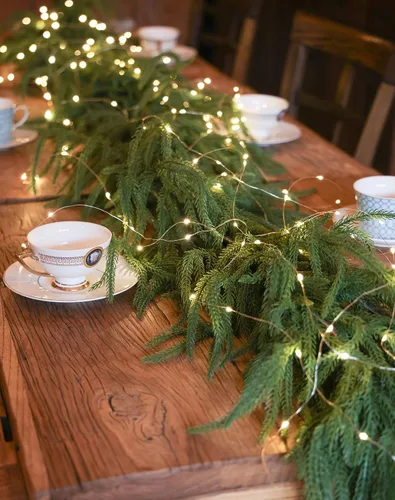 Vista 7 de MISSPIN 6ft Christmas Garland with String Lights, Real Touch Norfolk Pine Garland, Green Artificial Greenery Garland for Table, Mantle, Wall