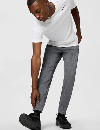 Vista 5 de Nike Therma-Fit - Pantalones de entrenamiento ajustados para hombre