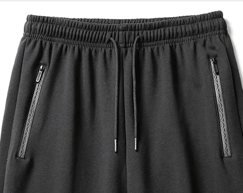 Vista 8 de oelaio Pantalones deportivos con forro polar para hombre, pantalones rectos sueltos grandes y altos, pantalones térmicos de forro polar para hombre