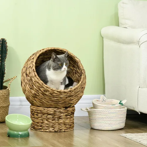 Vista 2 de PawHut Cama elevada tejida a mano para gatos con cojín suave y forma de silla de huevo, cama de cesta con soporte, casa de mimbre elevada para gatos