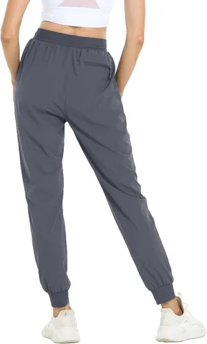 Vista 2 de MAGCOMSEN Pantalones de senderismo para mujer, de secado rápido, ligeros, con cintura elástica, con bolsillos con cremallera