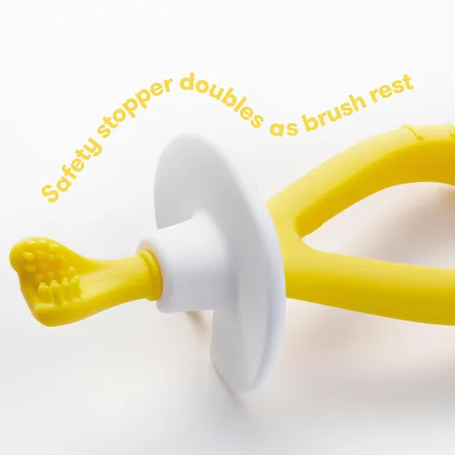 Vista 5 de Frida Baby Cepillo de dientes de entrenamiento para bebés con cerdas de silicona suave, amarillo
