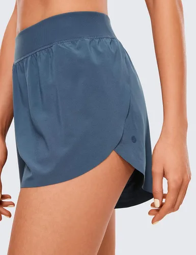 Vista 4 de CRZ YOGA Pantalones cortos de correr de cintura media para mujer, de secado rápido, ligeros, con abertura alta, pantalones cortos de entrenamiento