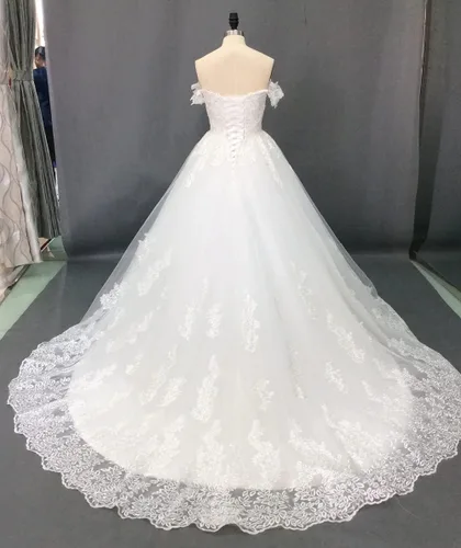 Vista 4 de XYAYE Verano playa una línea vestidos de novia para novia 2021 con mangas fuera del hombro vestido de novia con apliques XY013