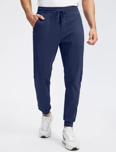 Vista 3 de Pudolla Pantalones deportivos con forro polar para hombre con 3 bolsillos con cremallera, pantalones cálidos para invierno, correr, entrenamiento