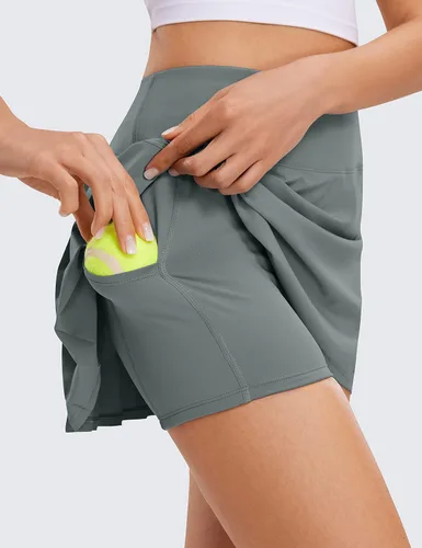 Vista 4 de CRZ YOGA Faldas de tenis plisadas para mujer con bolsillos, cintura alta, atléticas, para golf, faldas para mujer, suaves, transpirables, lindas