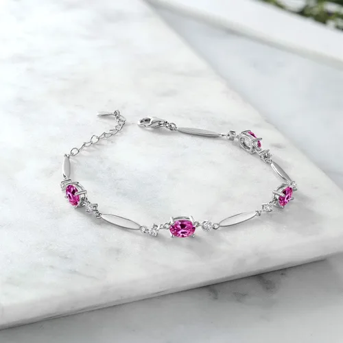 Vista 76 de Gem Stone King 925 Sterling Silver Gemstone Birthstone and White Created Sapphire Tennis Bracelet For Women Oval 7X5MM and 2MM 6 Inch + 1 Inch