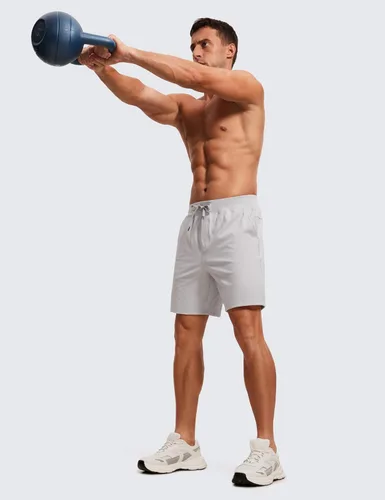 Vista 5 de CRZ YOGA Pantalones cortos de entrenamiento elásticos en cuatro direcciones para hombre, 7 pulgadas, suaves, duraderos, casuales, con bolsillos
