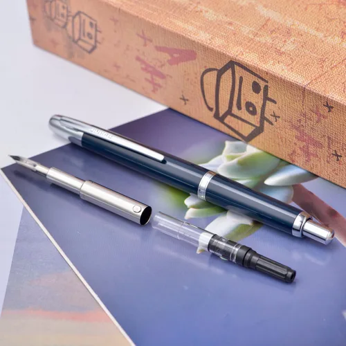 Vista 7 de Jinhao 20 Press Pluma estilográfica, azul oscuro con plumín fino retráctil y juego de convertidor de tinta (clip plateado)