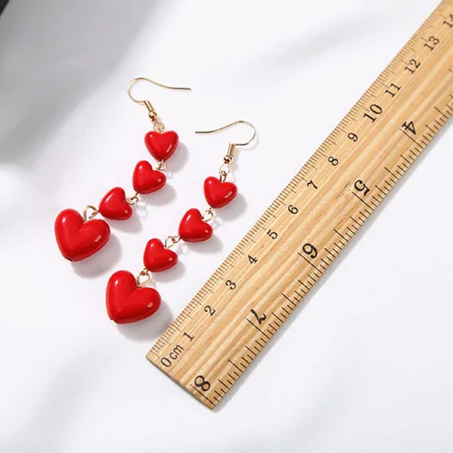 Vista 7 de Pendientes de borla de corazón rojo con cuentas de melocotón y borla larga para mujeres y niñas