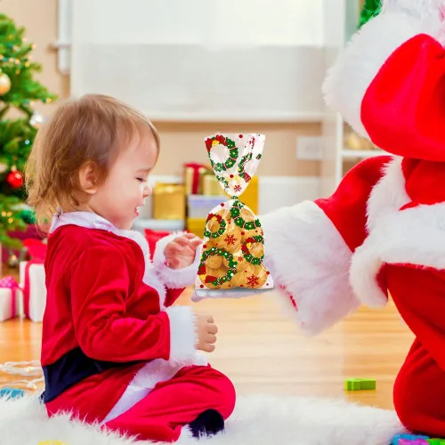 Vista 8 de DULEFUN 160 bolsas de celofán de Navidad, 8 estilos, transparentes para dulces, galletas, golosinas, bolsas de celofán con lazos de torsión