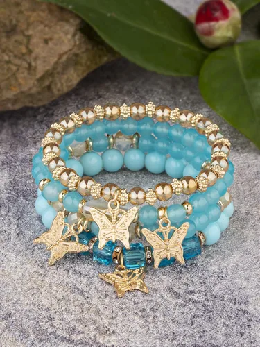 Vista 4 de Juego de pulseras con colgante de mariposa con cuentas de cristal bohemio, apilable, pulsera elástica apilable hecha a mano, multicapa colorida