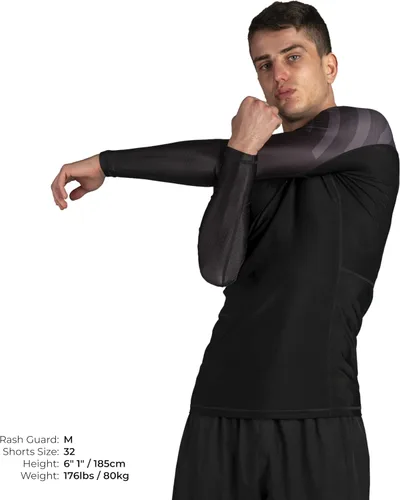 Vista 2 de Sanabul Essential - Camiseta de compresión de manga larga para entrenamiento de MMA, BJJ, lucha libre, agarre y Jiu Jitsu sin gi Todo negro