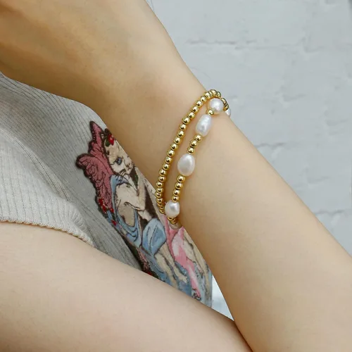 Vista 5 de Pulseras de cuentas de oro para mujer, perlas barrocas apilables, chapadas en oro de 14 quilates, pulsera de bolas elásticas para regalo de joyería