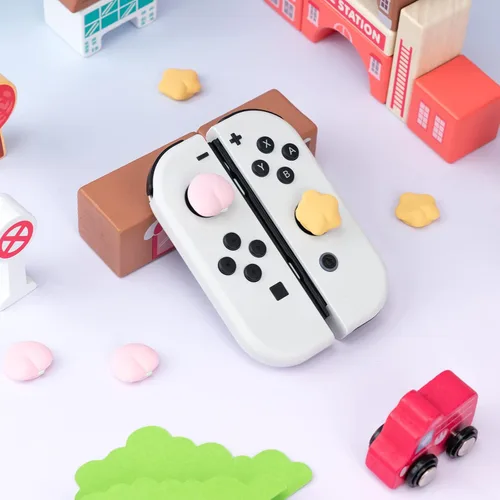 Vista 6 de GeekShare Lindas tapas de silicona con agarre para pulgar, cubierta de joystick compatible con Nintendo Switch OLED Switch Lite, 4