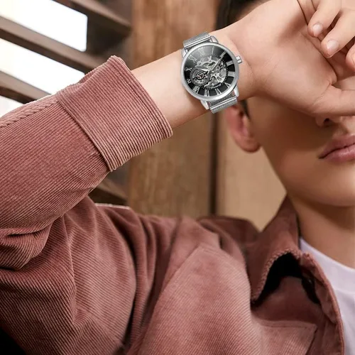 Vista 5 de Gosasa Reloj automático único para hombre, esfera transparente, esqueleto hueco, tono plateado, correa de malla, Oro Rosa