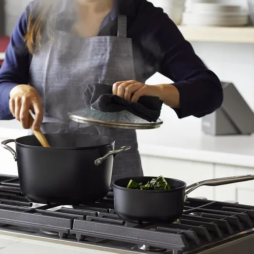 Vista 9 de KitchenAid - Juego de ollas y sartenes antiadherentes de inducción con anodizado duro, 10 piezas, color negro mate Juego de utensilios de cocina