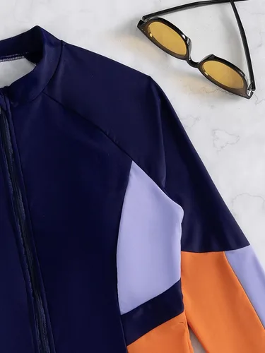 Vista 5 de WDIRARA Traje de baño de una pieza de manga larga para mujer, con estampado geométrico, cremallera frontal, control de abdomen