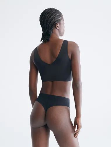 Vista 2 de Calvin Klein Sujetador Invisibles Comfort sin costuras con cuello en V ligeramente forrado para mujer, Descalzo, negro, castaño, castaño claro