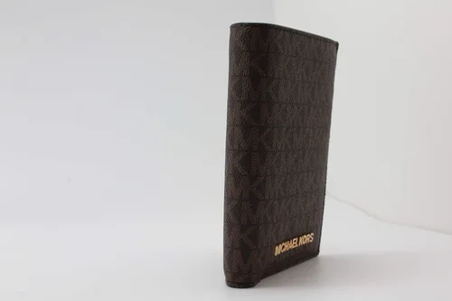 Vista 6 de Michael Kors Jet Set - Funda para pasaporte de viaje de PVC 2019 PVC marrón Cartera de viaje