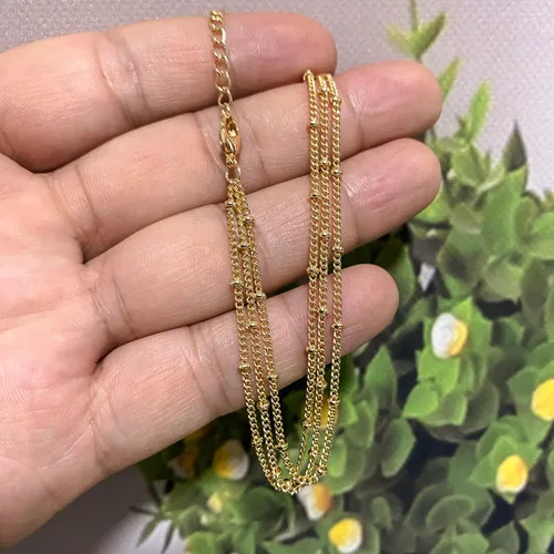 Vista 4 de Pulsera de cadena de elegante oro para mujer, pulseras de cadena individual o en capas, con eslabón de dije de corazón, karma, triángulo, perlas