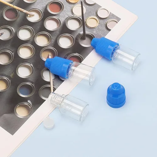 Vista 3 de 10 botellas de gotero transparentes de plástico vacías de 0.2 fl oz E-jugo E-líquido a prueba de niños, tapa azul