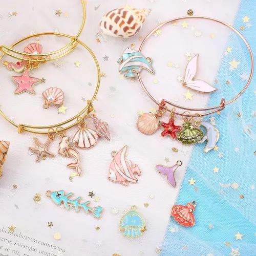 Vista 5 de MARFOREVER - 120 dijes de mar con temática oceánica para hacer joyas, dijes de playa Assorted Gold Enamel Starfish Seashell Marine Pendants