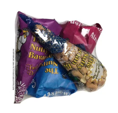 Vista 2 de The Nutty Bavarian Almendras tostadas glaseadas con canela, anacardos, nueces pecanas y anacardos ligeramente salados en paquete de 4 conos
