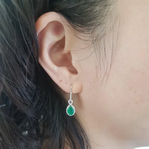 Vista 2 de Dazzlingrock Collection - Pendientes colgantes para mujer, diseño de infinito, color oro blanco