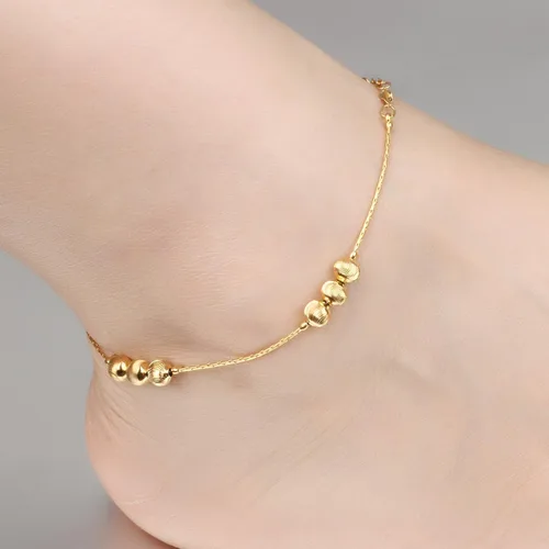 Vista 4 de Tobillera para mujer tono dorado de 18 quilates con cuentas de la suerte, cadena de hueso de serpiente, accesorio ajustable de 9.4in de largo
