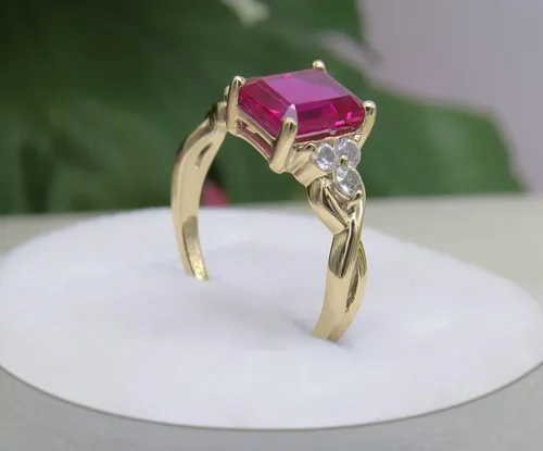 Vista 3 de Dazzlingrock Collection 8x6mm Emerald Shape Center Lab Created Ruby & 2.2mm Round White Sapphire on Side Crisscross Shank Engagement Ring for Her in