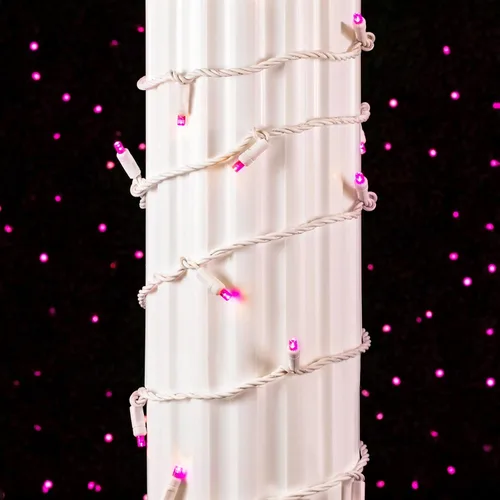 Vista 3 de Novelty Lights Guirnalda de luces de Navidad de 25 pies, 50 bombillas LED rosas en cable blanco, espacio de 6 pulgadas, iluminación conectable