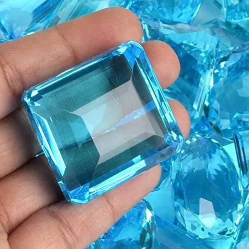 Vista 4 de GEMHUB Juego al por mayor de 4 piezas aproximadamente 200 Ct brillante topacio azul suizo facetado mezcla corte de joyería que hace piedras