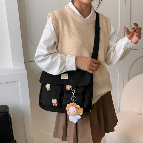 Vista 2 de Bolso cruzado de lona con alfileres Kawaii y colgante para mujeres y niñas bolso de mensajero casual para estudiantes mochila escolar