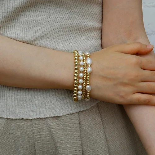 Vista 5 de Pulseras de cuentas de oro para mujer, perlas barrocas apilables, chapadas en oro de 14 quilates, pulsera de bolas elásticas para regalo de joyería