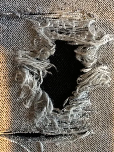 Vista 3 de Parches de mezclilla elástica negra súper resistente para planchar - de Holey Patches (tamaños surtidos) (1-5" x 8")