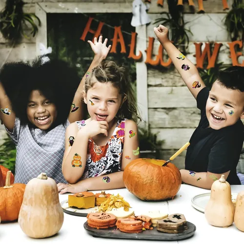 Vista 7 de 124 tatuajes temporales de Halloween que brillan en la oscuridad para niños, calcomanías de tatuaje falsas luminosas impermeables para fiesta