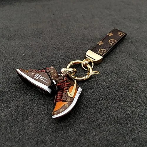 Vista 3 de Accesorios para llavero de zapatos deportivos con llavero de cuero y mini pulsera de zapatos 3D, llavero de moda para mujeres y hombres