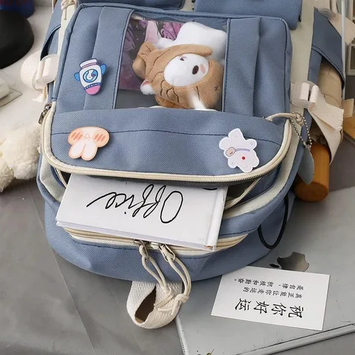 Vista 3 de Rcuyyl Mochila Kawaii con dijes y pines de accesorios, juego de 5 unidades, bonita mochila para mochila escolar, mochila de viaje de 17 pulgadas